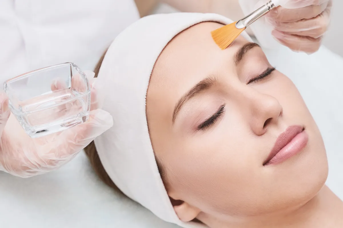 Woman receiving a professional VI Peel treatment at Aesthetic Specialists